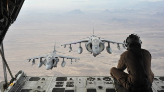 Fighter jet cockpit desert sky - over a desert landscape free wallpaper