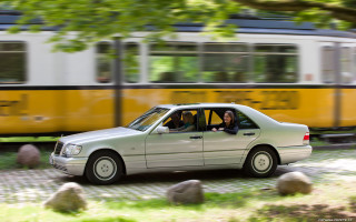 Woman driving car street yellow - viennese actionism free wallpaper