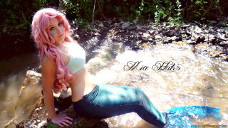 Pink hair mermaid rock river - a rock in a river free wallpaper
