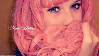 Woman pink hair blue eyes 2 - a pink wig free wallpaper