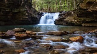 Waterfall forest rocks waterflow nature 3 - a waterfall in a forest free wallpaper