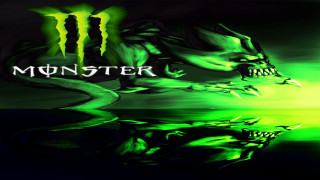 Monster green black background face - a monster free wallpaper
