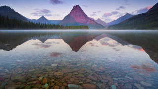 Mountain range lake sunset pink - a still lake free wallpaper