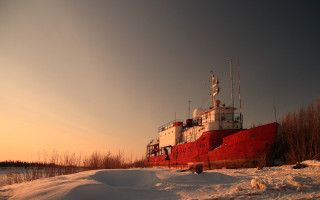 Large red boat snow field - field next free wallpaper