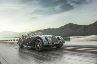 Vintage car driving road mountains - a vintage car free wallpaper for desktop