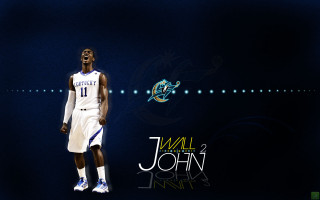 Basketball player blue background holding - his hand and a basketball free wallpaper