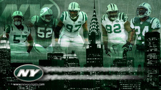 Football players city skyline skyscrapers - a group of football players free wallpaper