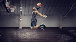Man jumping basketball air hand - his hand and a basketball free wallpaper