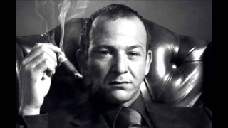 Man suit smoking cigarette holding 2 - david lazar free wallpaper for desktop