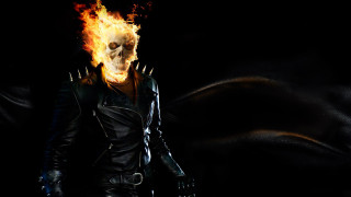 Flaming skull man black background - vfx free wallpaper for desktop