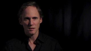 Man black shirt serious look 13 - his face and shoulders free wallpaper for desktop