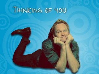 Man lying blue background smile - a blue swirl free wallpaper for desktop