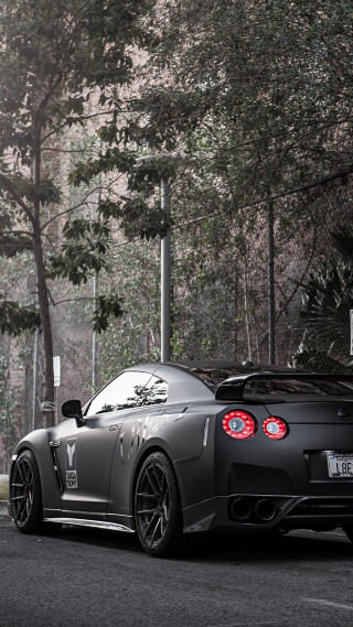 Black sports car tree lined - fine art free wallpaper for mobile