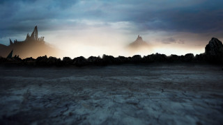 Dark landscape rocks mountain distance - a dark landscape free wallpaper