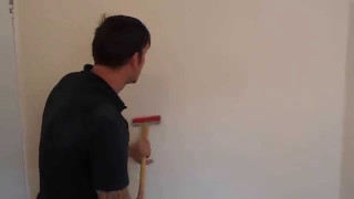 Man holding paint roller wall - a minimalist painting free wallpaper for desktop