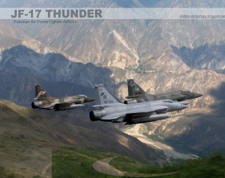 Military jets flying mountain range - over a mountain range in the sky free wallpaper