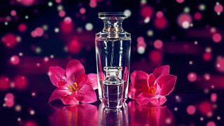 Perfume bottle pink flowers table - a bottle of perfume free wallpaper