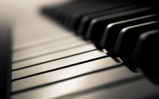 Piano keyboard black white cinematic - a close up of a piano keyboard free wallpaper