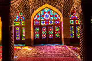 Colorful stained glass window columns - the floor and a rug free wallpaper