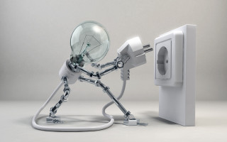 Robot holding light bulb plugged - a robot holding free wallpaper for desktop