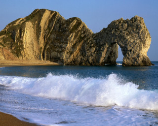 Large rock formation beach ocean 3 - top of a beach next free wallpaper