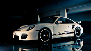 White porsche sports car garage - a white porsche sports car free wallpaper