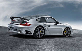 Silver sports car gravel road 3 - the rear end of the car free wallpaper