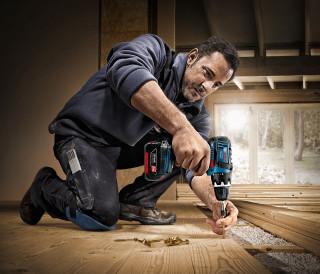 Man working floor drill screwdriver - doug ohlson free wallpaper