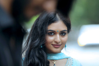 Woman blue blouse necklace man - movie still frame free wallpaper for desktop