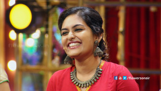 Woman smiling red top gold - a red curtain behind her free wallpaper