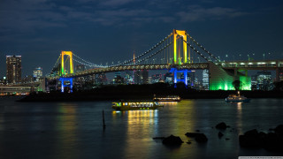 Bridge lit night water city - vivid color free wallpaper