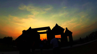 Group people wooden structure sunset - basuki abdullah free wallpaper