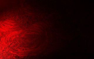 Red light black background swirly - a red light in the middle free wallpaper