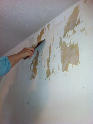Man painting brown wall white - hard free wallpaper for mobile