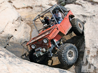 Jeep driving rocky area man - a rocky area free wallpaper