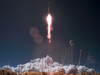 Rocket flying smoke tower background - a rocket free wallpaper