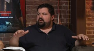 Man sitting chair hands brick - eamon everall free wallpaper