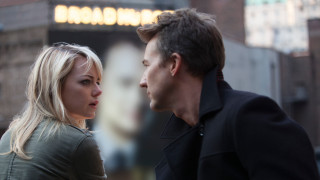 Man woman standing building sign - stuckism free wallpaper for desktop