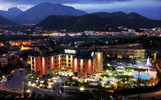 City night buildings lights mountains - a few car free wallpaper