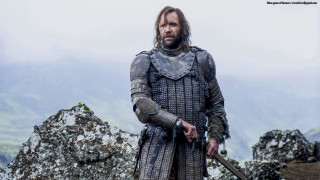 Medieval man sword rock mountain - a mountain in the distance free wallpaper