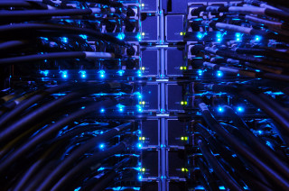 Server wires blue lights glowing - a blue light free wallpaper