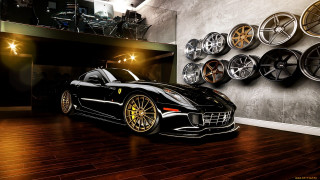 Black sports car garage wheels - a black sports car free wallpaper