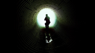Person standing dark tunnel bike - colin hayes free wallpaper