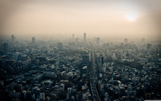 Cityscape tallbuildings hazy skyline bridge - a hazy sky in the background free wallpaper