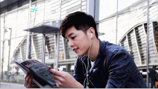 Man listening music reading book - headphone free wallpaper