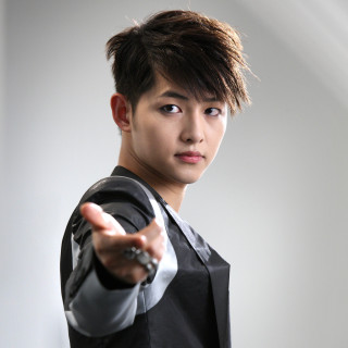 Man black shirt vest pointing - handsome free wallpaper for tablet