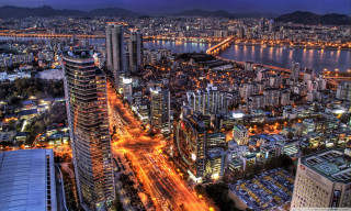 Cityscape tall buildings river nighttime 2 - free city wallpaper for desktop