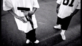 Two men street cellphone laptop - a street holding free wallpaper for desktop