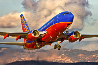 Southwest airlines plane flying mountain - david wojnarowicz free wallpaper