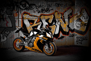 Motorcycle parked graffiti wall writing - rembrandt style free wallpaper